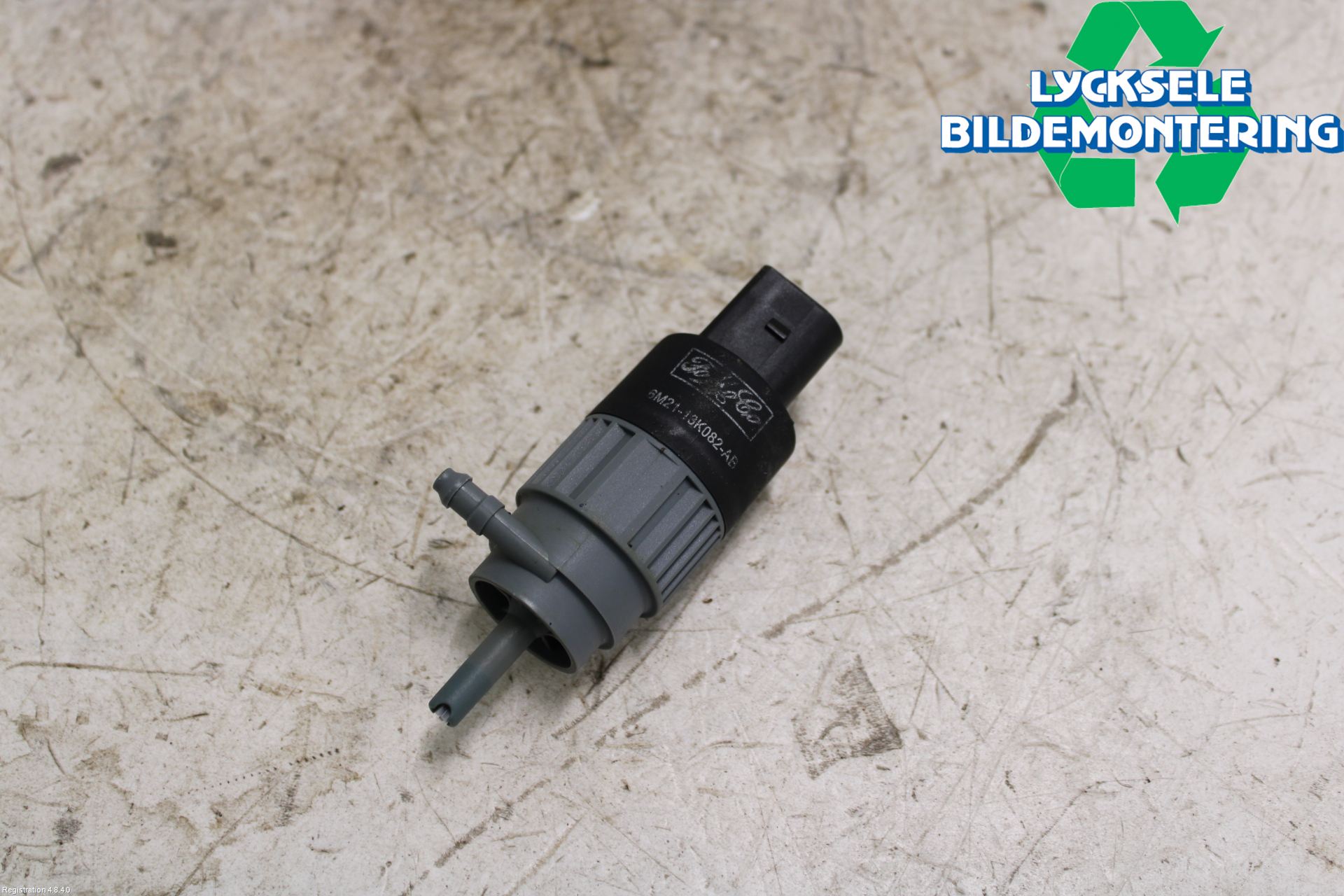 Mô Tơ Rửa Đèn Pha Ford Fiesta Mã phụ tùng 6m2113k082ab