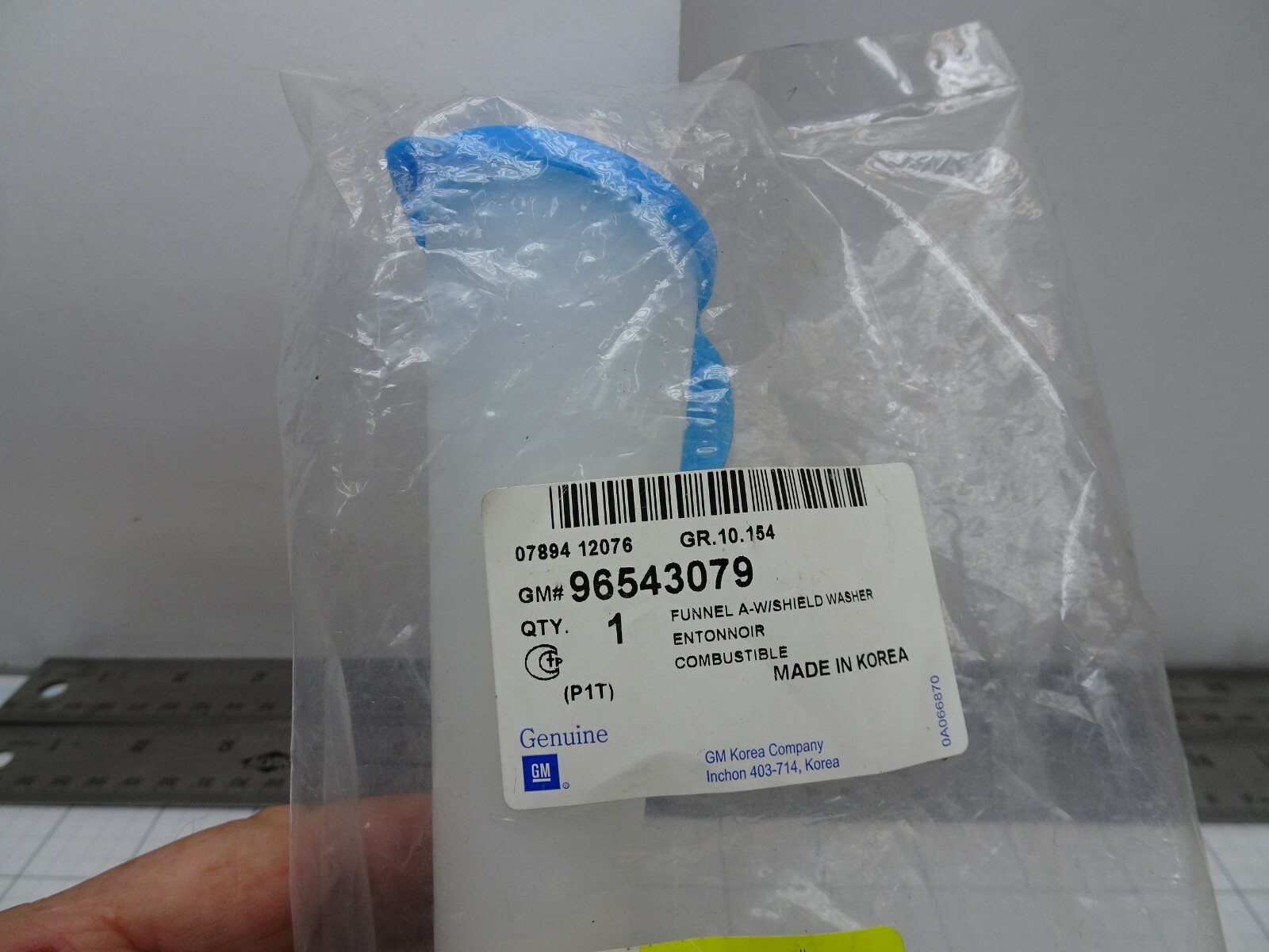 Ống Đổ Nước Rửa Kính Daewoo Gentra Mã phụ tùng 96543079