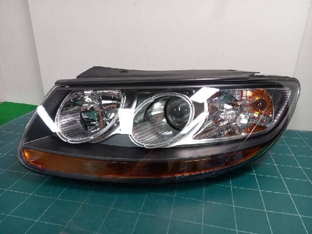 Đèn pha Santafe New (Vàng) Mã phụ tùng 921012B000
