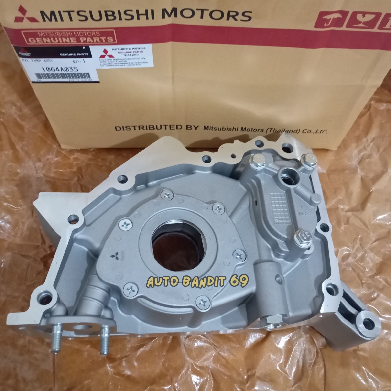 Bơm nhớt máy Triton (Bơm dầu) Mã phụ tùng 1064A305XT