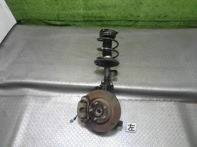 Giảm Xóc Trước Trái Nissan Teana OEM E4303JN00C