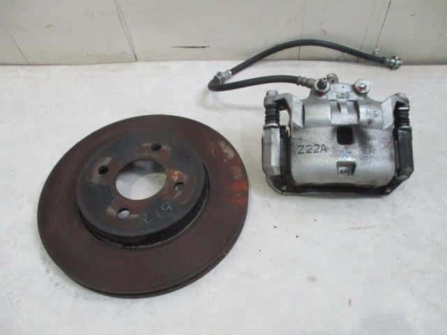 Cụm Gông Phanh Trước Phải Nissan Sunny Mã phụ tùng 410013HA0A