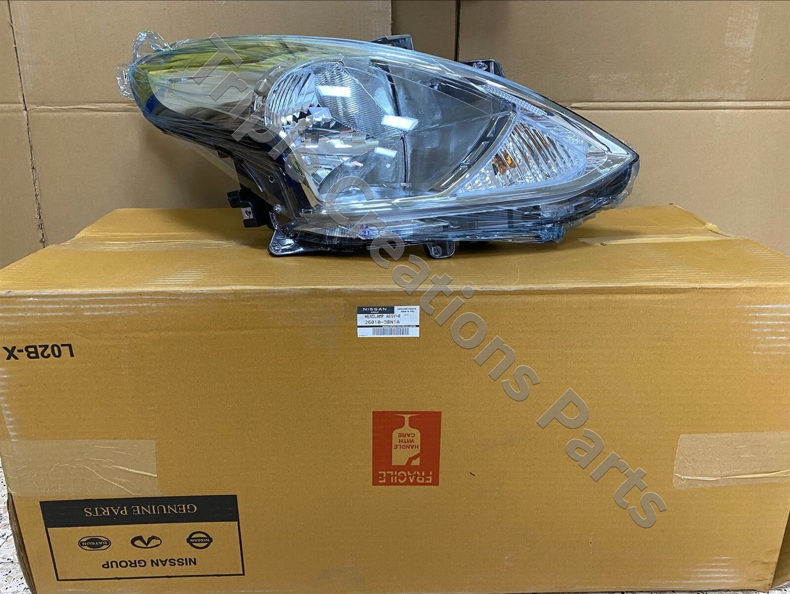 Đèn Pha Phải Nissan Livina Mã phụ tùng 26010CJ00B