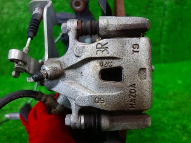 Giá Bắt May Ơ Sau Phải Mazda CX-5 Mã phụ tùng KD312611XE