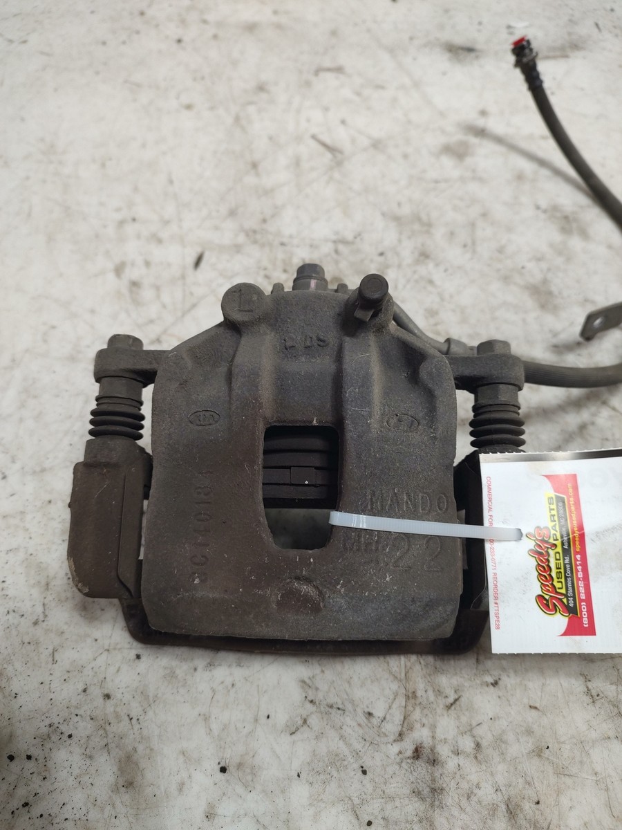 Cụm Gông Phanh Trước Trái Kia Rio Mã phụ tùng 581801RA00